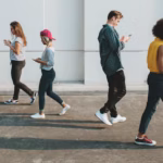 walking-people-keeping-distance-protect-from-covid-19-viruses-wallpaper_53876-144214